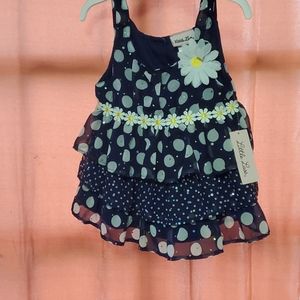 Blue flower tank with white shorts